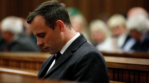 Paralympian athlete Oscar Pistorius (L), accused of the murder of his girlfriend Reeva Steenkamp three years ago, looks on during the hearing in his murder trail at the High Court in Pretoria, on July 6, 2016. - Paralympian Oscar Pistorius will learn on July 6 how long he will spend in jail when a judge sentences him for murdering his girlfriend Reeva Steenkamp three years ago. Pistorius was freed from prison in the South African capital Pretoria last October after serving one year of a five-year term for culpable homicide -- the equivalent of manslaughter. (Photo by MARCO LONGARI / POOL / AFP)
