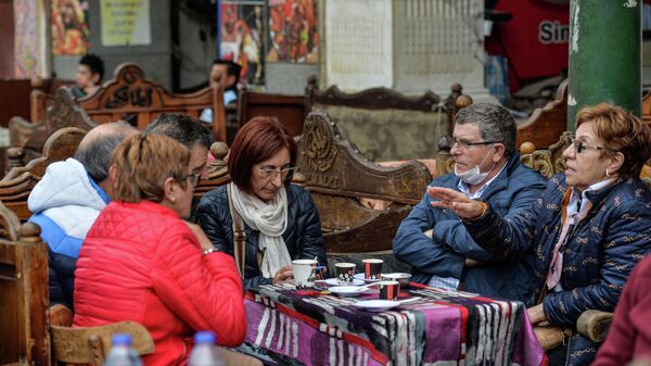Туристы в кафе, Каир