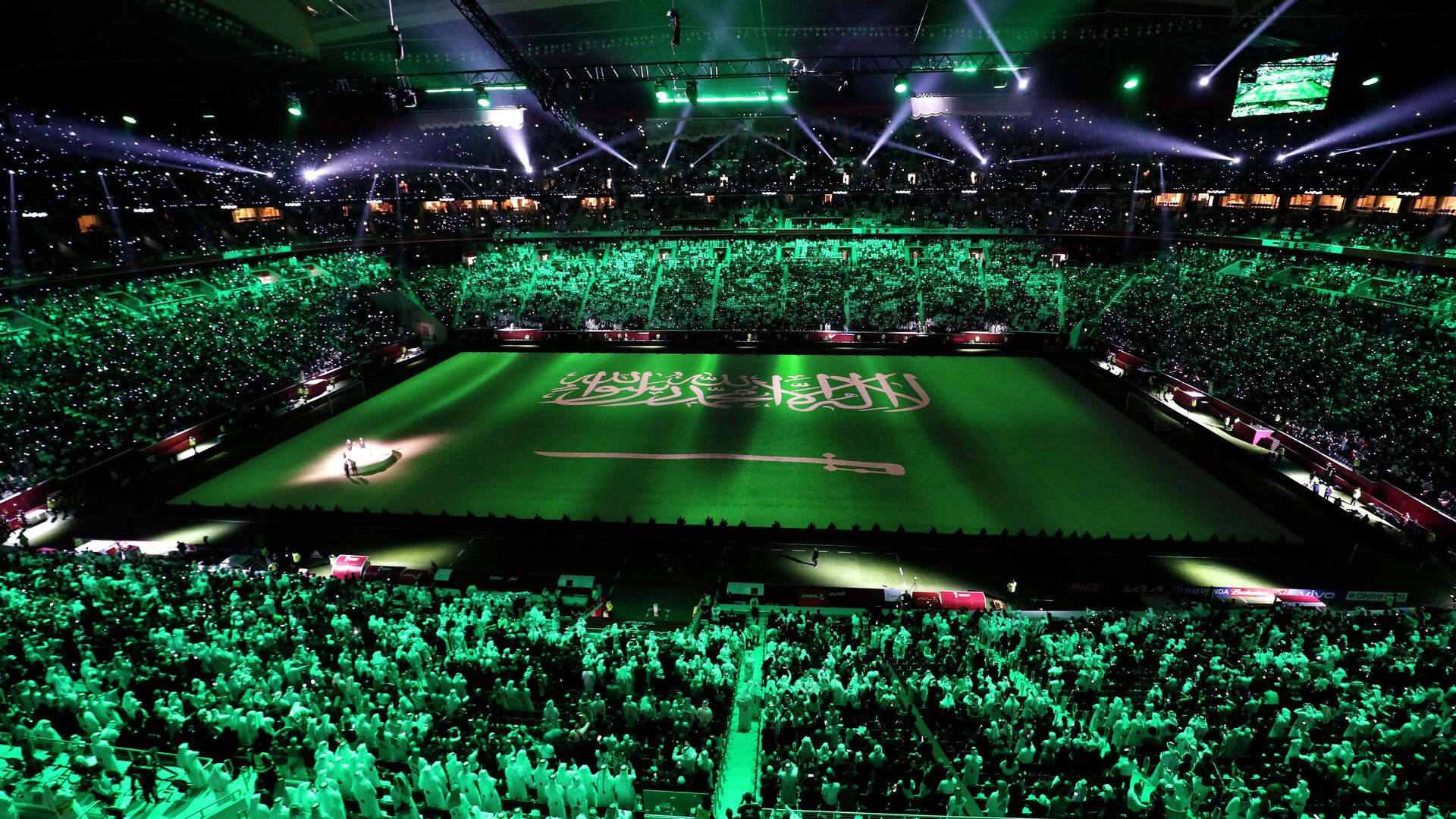 Soccer Football - Arab Cup - Group A - Qatar v Bahrain - Al Bayt Stadium, Al Khor, Qatar - November 30, 2021 Saudi Arabia flag is seen during the opening ceremony REUTERS/Amr Abdallah Dalsh - РИА Новости, 1920, 30.11.2021