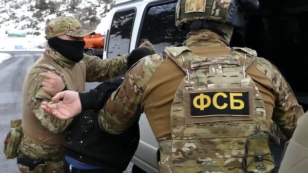 Сотрудники ФСБ России во время задержания