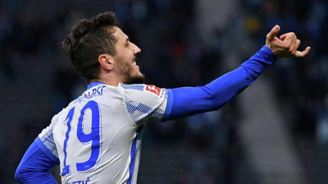 Hertha Berlin's Montenegrin forward Stevan Jovetic celebrates after scoring the 1-0 during the German first division Bundesliga football match between Hertha Berlin and Bayer Leverkusen in Berlin, Germany, on November 7, 2021. (Photo by John MACDOUGALL / AFP) / DFL REGULATIONS PROHIBIT ANY USE OF PHOTOGRAPHS AS IMAGE SEQUENCES AND/OR QUASI-VIDEO