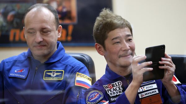 Члены основного экипажа 20-й экспедиции на МКС космонавт Роскосмоса Александр Мисуркин и Юсаку Маэдзава