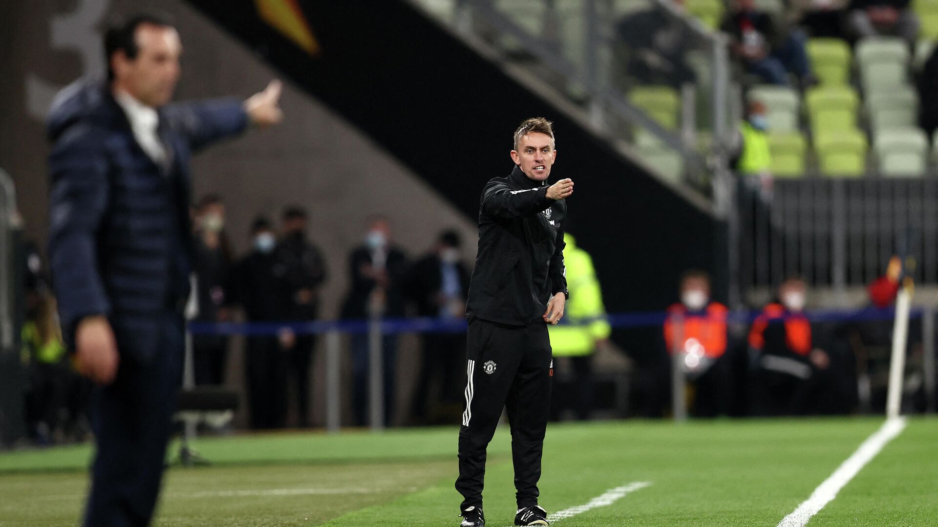Manchester United's Northern Irish first-team coach Kieran McKenna speaks to the players during the UEFA Europa League final football match between Villarreal CF and Manchester United at the Gdansk Stadium in Gdansk on May 26, 2021. (Photo by MAJA HITIJ / POOL / AFP) - РИА Новости, 1920, 17.12.2021