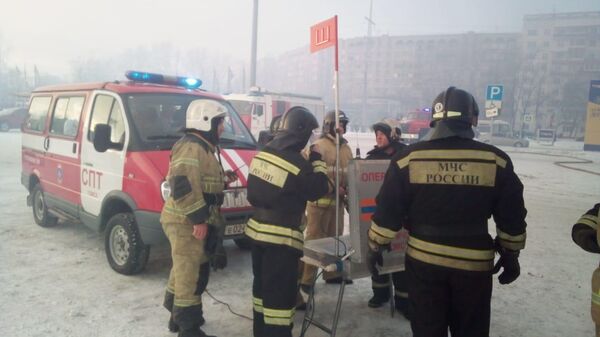Тушение пожара в торговом центре Лента в Томске