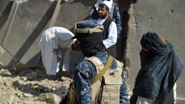 Члены Талибана на месте операции против группы Вилаят Хорасан* в Кандагаре