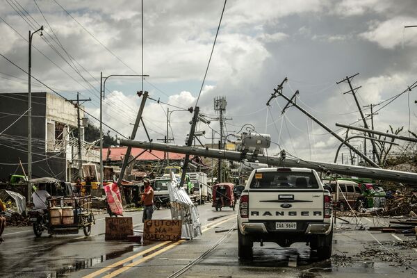 Последствия супертайфуна Раи в городе Суригао на Филиппинах