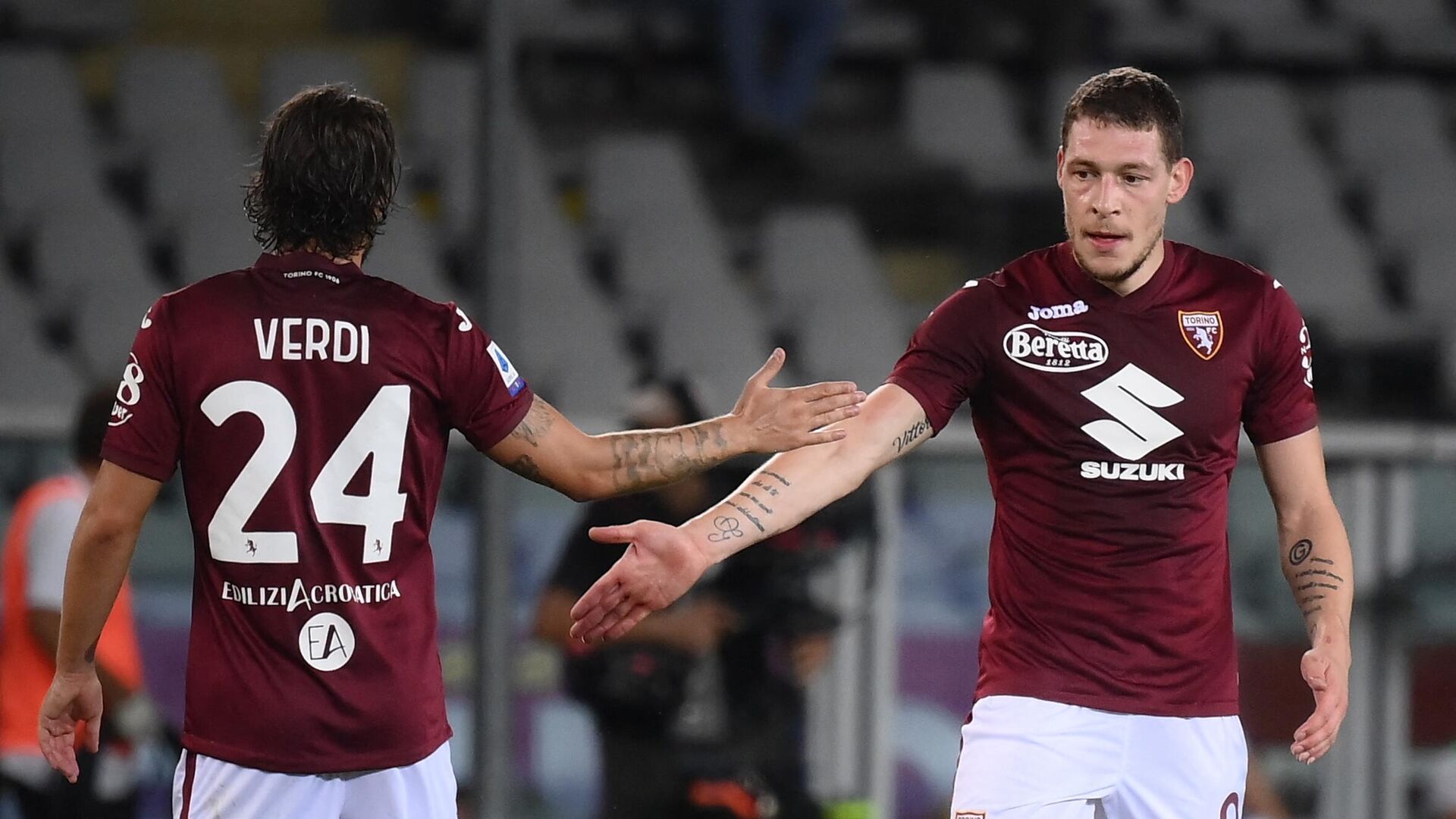 Torino's Italian forward Andrea Belotti celebrates with teammates during the Italian Serie A football match Torino vs Atalanta Bergamo at the Grande Torino Stadium in Turin on August 21, 2021. (Photo by MARCO BERTORELLO / AFP) - РИА Новости, 1920, 25.12.2021