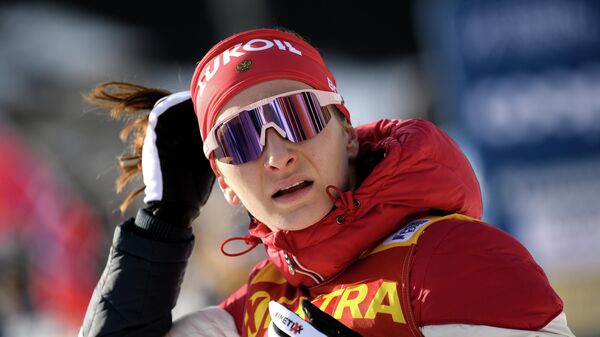 Наталья Непряева (Россия) после финиша дистанции масс-старта классическим стилем на соревнованиях среди женщин по лыжным гонкам Тур де Ски в Валь-ди-Фьемме.