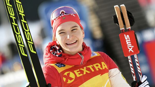 Наталья Непряева (Россия) после финиша дистанции масс-старта классическим стилем на соревнованиях среди женщин по лыжным гонкам Тур де Ски в Валь-ди-Фьемме.