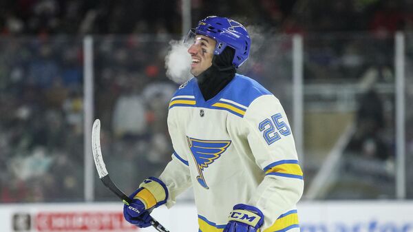 MINNEAPOLIS, MN - JANUARY 01: Jordan Kyrou #25 of the St. Louis Blues reacts after scoring a goal against the Minnesota Wild in the second period of the game during the NHL Winter Classic at Target Field on January 1, 2022 in Minneapolis, Minnesota.   David Berding/Getty Images/AFP (Photo by David Berding / GETTY IMAGES NORTH AMERICA / Getty Images via AFP)