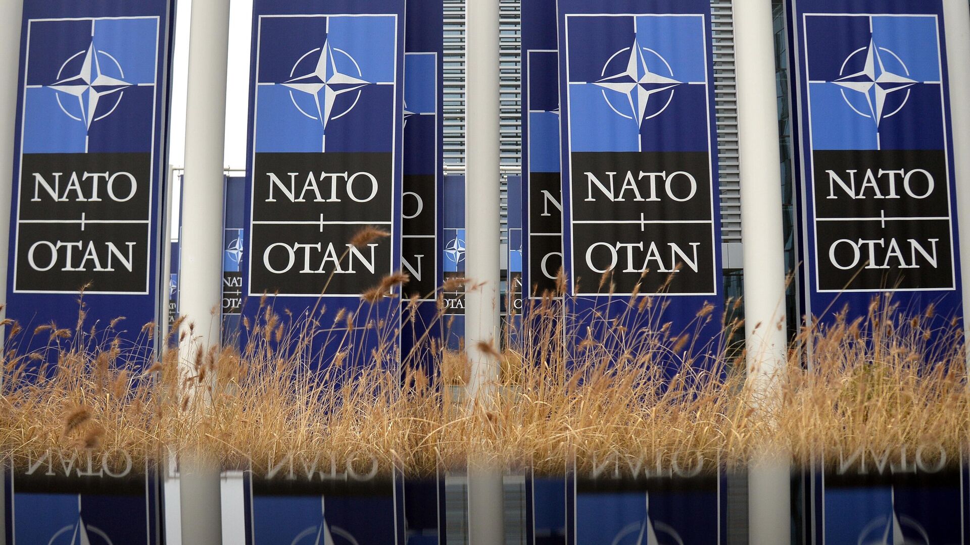 Banners with the NATO logo in front of the organization's headquarters in Brussels - 1920, 01/29/2022
