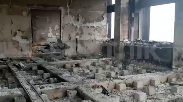 Последствия поджога здания мэрии Алма-Аты в ходе беспорядков 5 января