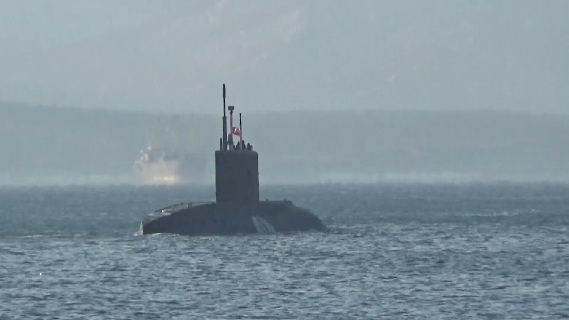 Подводная лодка Волхов во время учений в акватории Японского моря. Кадр видео - РИА Новости, 1920, 20.01.2022