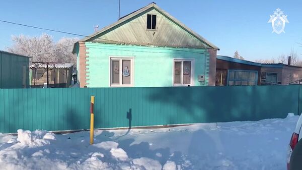 Дом в селе Юрьевка Омской области, где произошло убийство семьи из трех человек