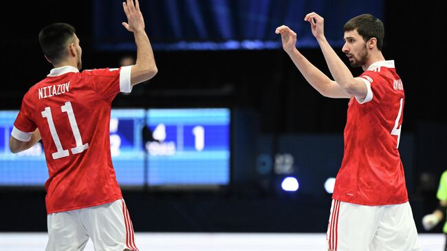 AMSTERDAM, NETHERLANDS - JANUARY 21: Artem Antoshkin of Russia celebrates after scoring his team's first goal during the UEFA Futsal Euro 2022 group C match between Russia and Slovakia at Ziggo Dome on January 21, 2022 in Amsterdam, Netherlands. (Photo by Oliver Hardt - UEFA/UEFA via Getty Images)