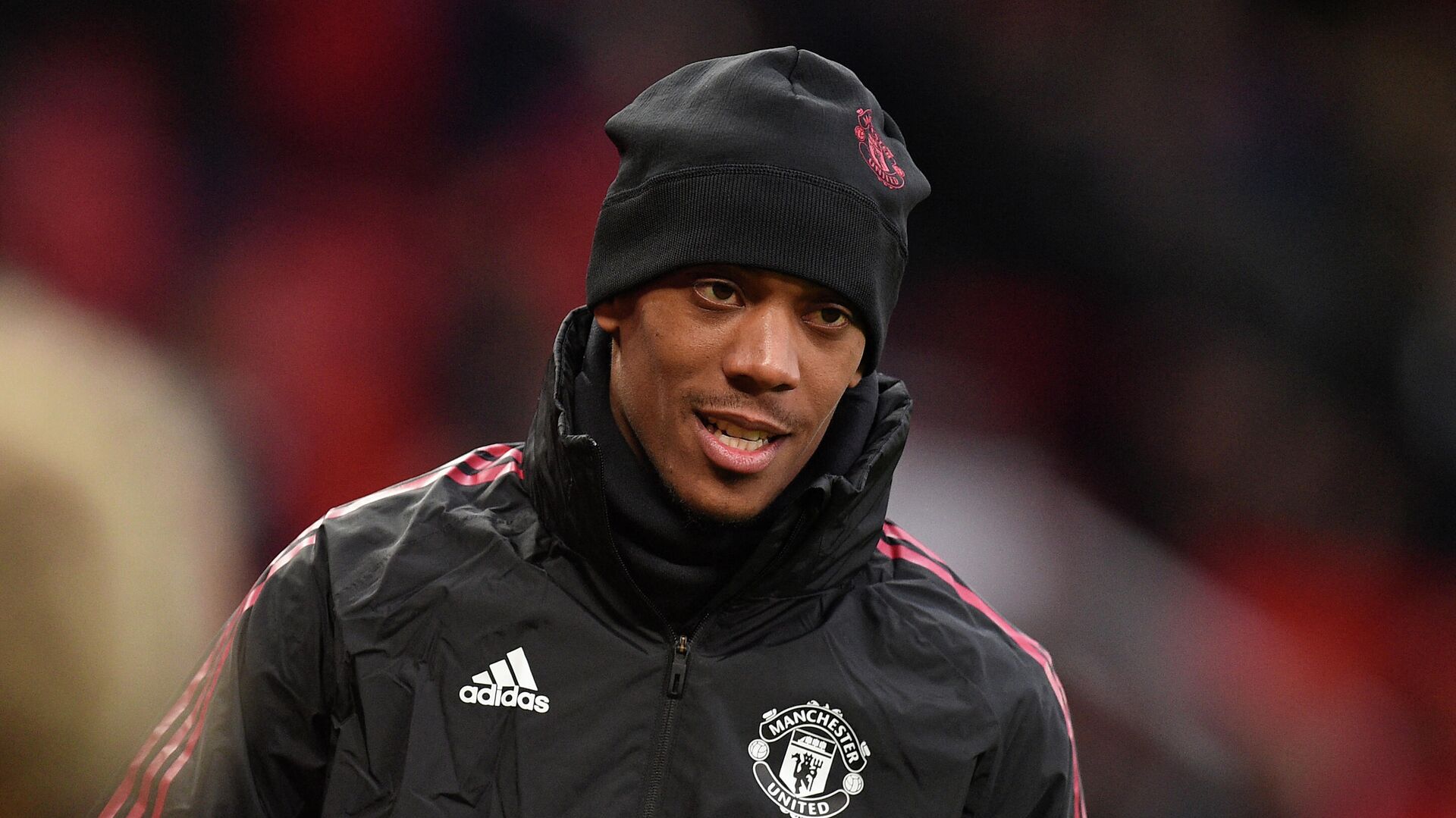 Manchester United's French striker Anthony Martial warms up ahead of the English Premier League football match between Manchester United and West Ham United at Old Trafford in Manchester, north west England, on January 22, 2022. (Photo by Oli SCARFF / AFP) / RESTRICTED TO EDITORIAL USE. No use with unauthorized audio, video, data, fixture lists, club/league logos or 'live' services. Online in-match use limited to 120 images. An additional 40 images may be used in extra time. No video emulation. Social media in-match use limited to 120 images. An additional 40 images may be used in extra time. No use in betting publications, games or single club/league/player publications. /  - РИА Новости, 1920, 26.01.2022