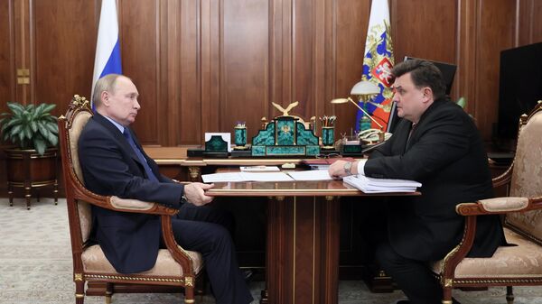 Президент РФ Владимир Путин и министр юстиции РФ Константин Чуйченко во время встречи