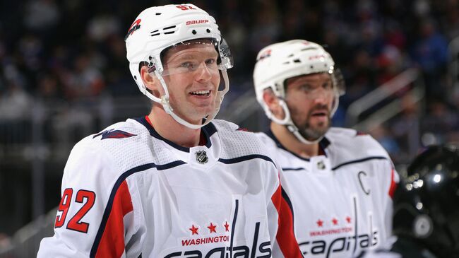 ELMONT, NEW YORK - JANUARY 15: Evgeny Kuznetsov #92 of the Washington Capitals skates against the New York Islanders at the UBS Arena on January 15, 2022 in Elmont, New York.   Bruce Bennett/Getty Images/AFP (Photo by BRUCE BENNETT / GETTY IMAGES NORTH AMERICA / Getty Images via AFP)