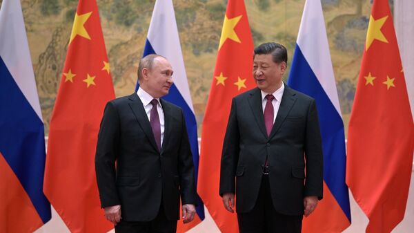  Президент России Владимир Путин и председатель КНР Си Цзиньпин во время встречи в Пекине