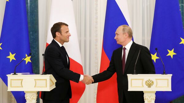 Президент России Владимир Путин и президент Франции Эммануэль Макрон