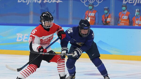 Хоккейный матч между женскими сборными Финляндии и Японии