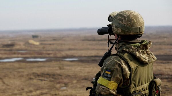Украинский военнослужащий во время учений в Ровенской области, Украина. 16 февраля 2022