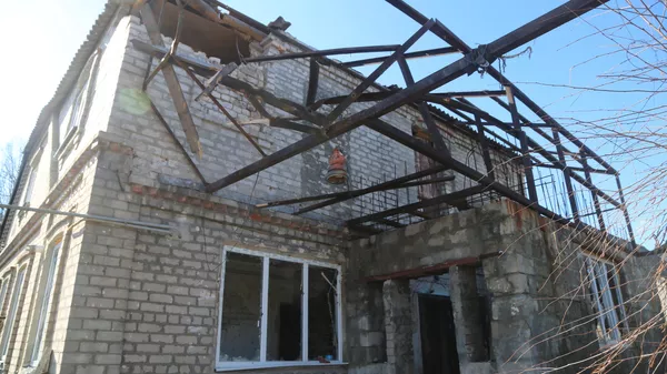 Ένα κτίριο κατοικιών στην περιοχή Kievsky του Ντόνετσκ, όπου μια ουκρανική ομάδα δολιοφθοράς εκκαθαρίστηκε τη νύχτα της 20ης Φεβρουαρίου