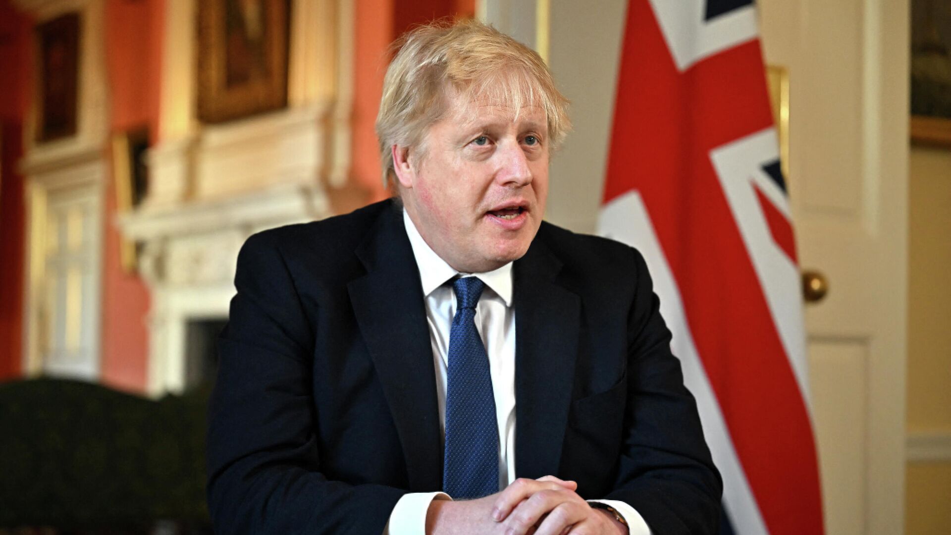 Премьер-министр Великобритании Борис Джонсон во время записи обращения после заседания по ситуации на Украине - РИА Новости, 1920, 01.03.2022
