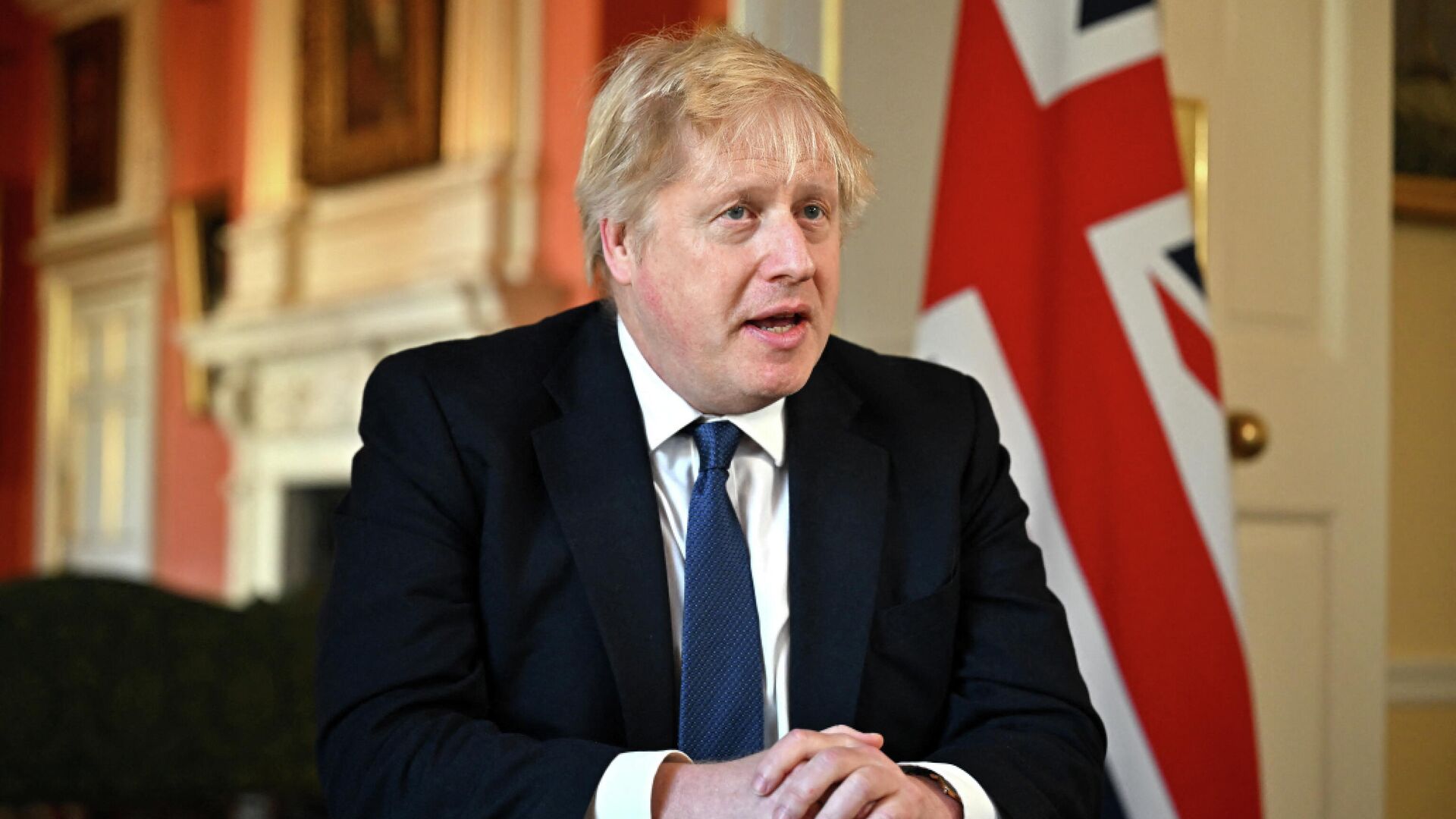 Премьер-министр Великобритании Борис Джонсон во время записи обращения после заседания по ситуации на Украине - РИА Новости, 1920, 01.03.2022