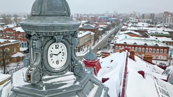 Clock tower on the building of the city hall of Tomsk