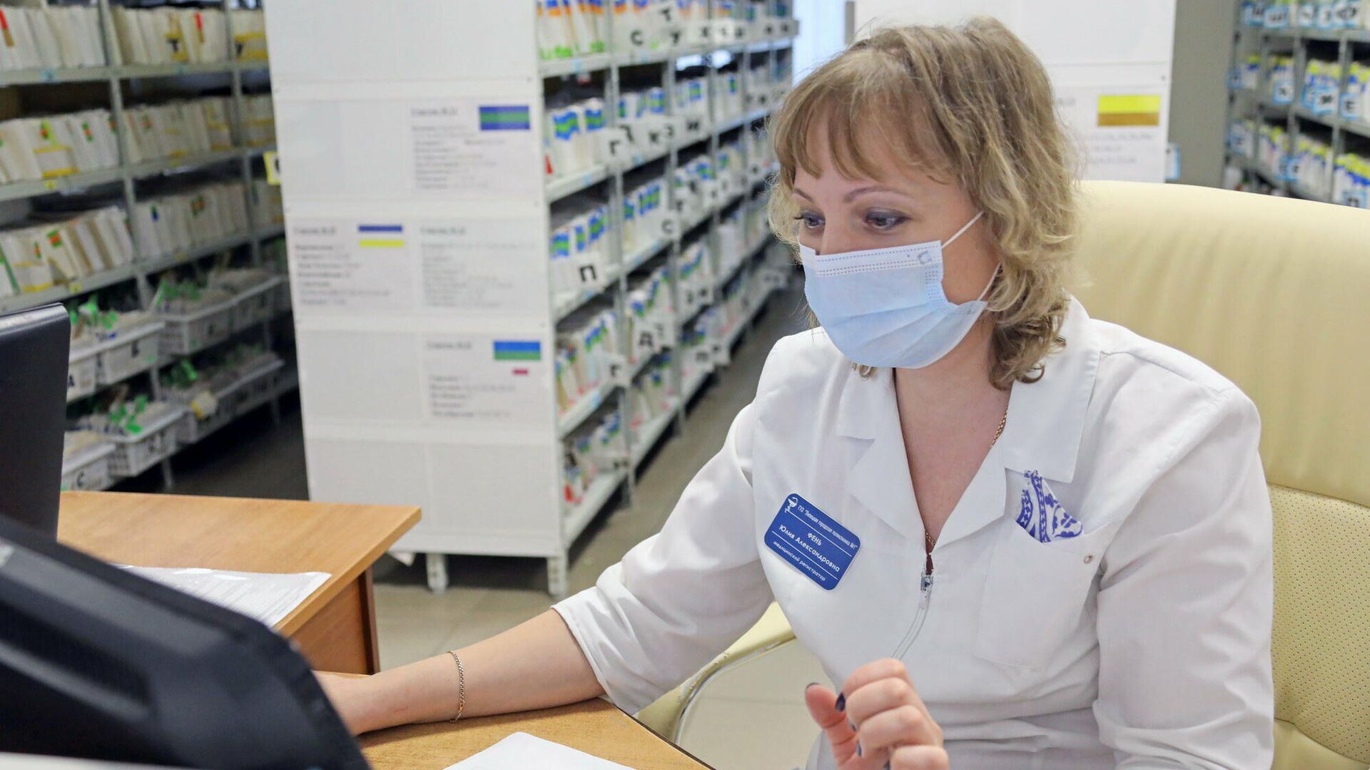 Работник регистратуры в медицинском учреждении Липецкой области - РИА Новости, 1920, 28.02.2022