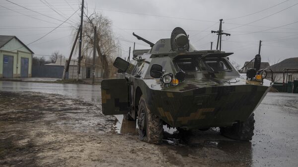 Брошенная военная техника ВСУ на улице поселения в Луганской народной республике