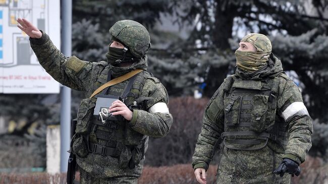 Военнослужащие России на территории Запорожской атомной электростанции, расположенной в степной зоне на берегу Каховского водохранилища в Запорожской области Украины в городе Энергодар