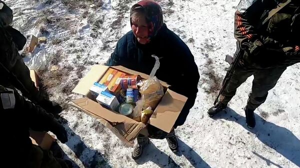 Раздача гуманитарной помощи в Киевской области российскими военными