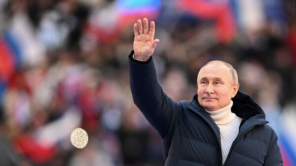 Президент РФ Владимир Путин выступает на митинге-концерте в Лужниках, посвященном воссоединению Крыма с Россией