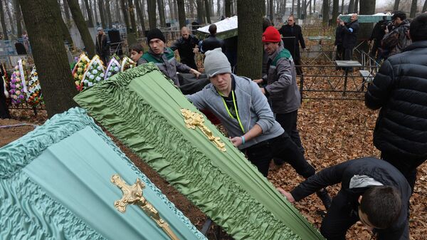 Прощание со школьниками, погибшими при артобстреле школы в Донецке