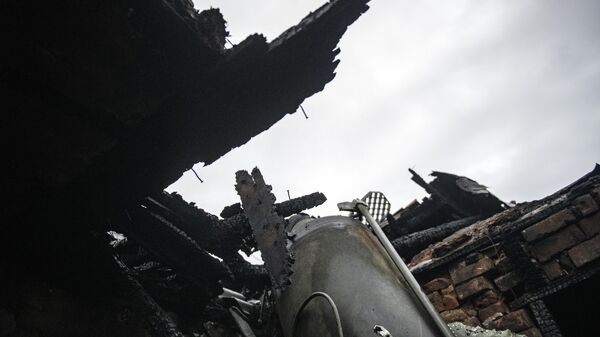 Последствия попадания снаряда ВСУ в ЛНР