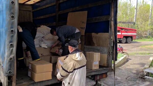 Кадры доставки первого гуманитарного груза из Луганска в Кременную