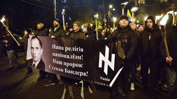 Участники марша, приуроченного к 112 годовщине со дня рождения Степана Бандеры, в Киеве.