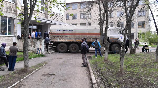 Машина МЧС с доставленной из России гуманитарной помощью в Купянске