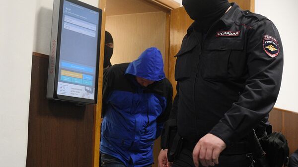 Максим Дружинин, обвиняемый по делу о покушении на телеведущего Владимира Соловьева, в Басманном суде Москвы