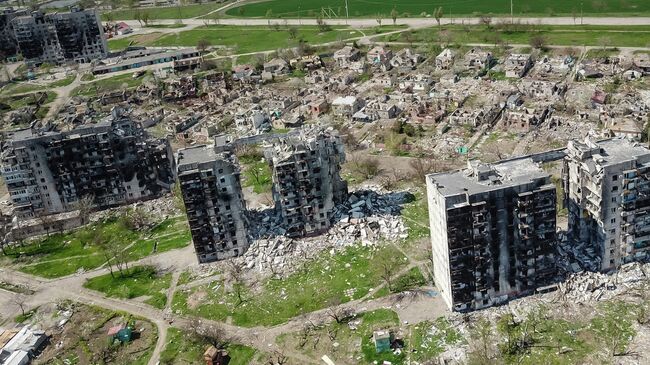 Разрушенные дома в Левобережном районе Мариуполя