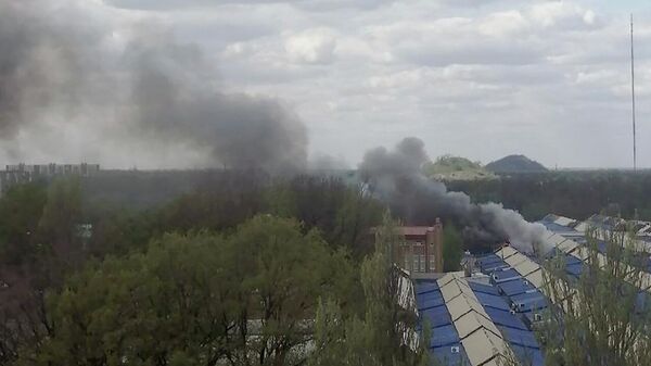 Последствия обстрела рынка Сокол в Донецке
