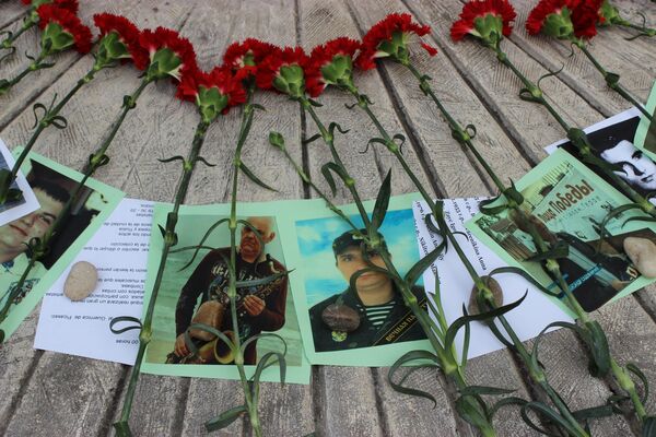 Во время акции памяти по погибшим в Доме профсоюзов в Одессе 2 мая 2014 года.