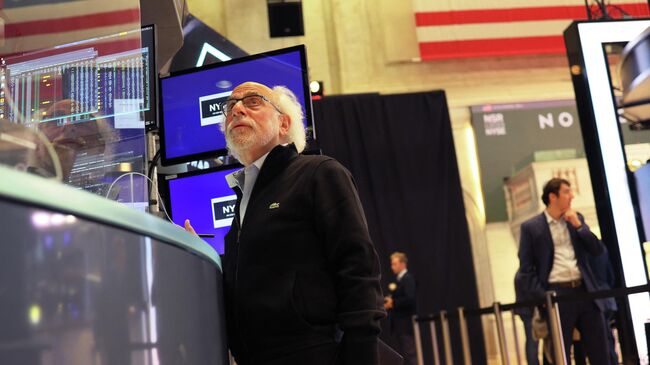 Трейдеры в зале Нью-Йоркской фондовой биржи