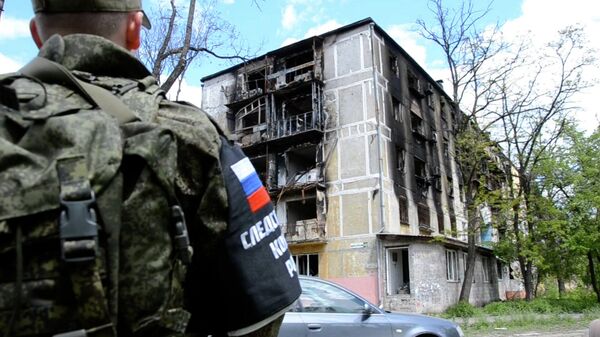 Работа военных следователей СК России в Мариуполе