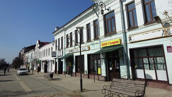 Улица Мира (Торговая). Купеческие магазины и аптека Макарова