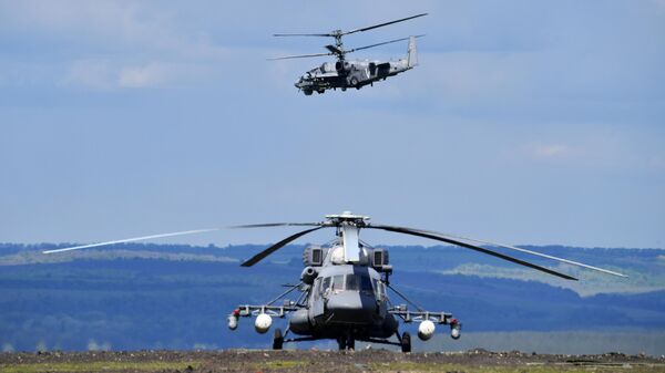 Вертолет Ми-8 АМТШ, задействованный в специальной военной операции на Харьковском направлении, на полевом аэродроме