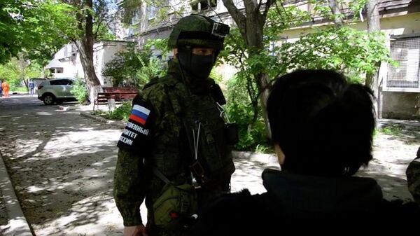 Жители Мариуполя рассказали военным следователям о мародерстве украинских боевиков