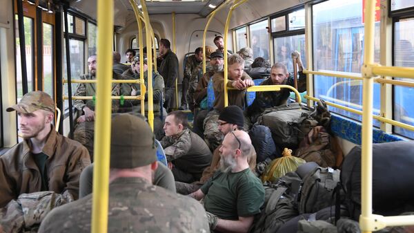 Surrendered Ukrainian soldiers and militants of the Azov nationalist battalion in a bus leaving the territory of the Azovstal plant in Mariupol